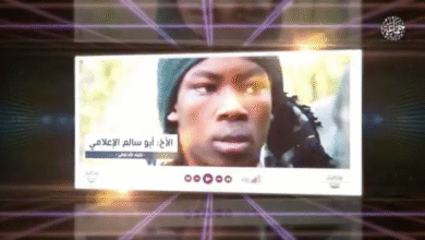 A different picture of Abu Salim in the JAS video wearing a similar green scarf.