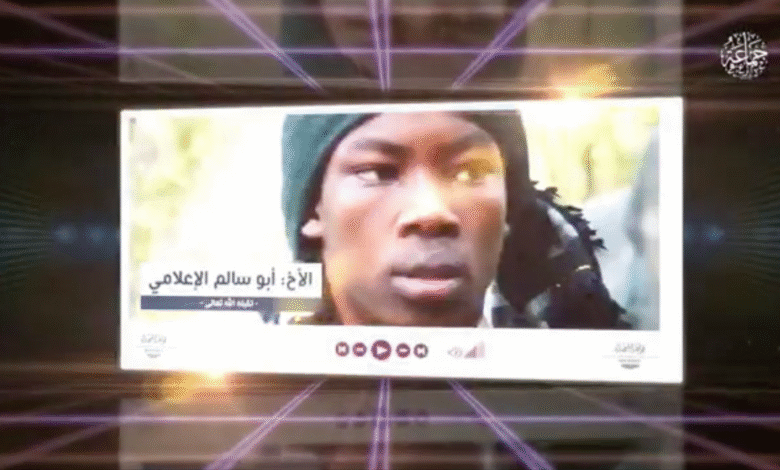 A different picture of Abu Salim in the JAS video wearing a similar green scarf.