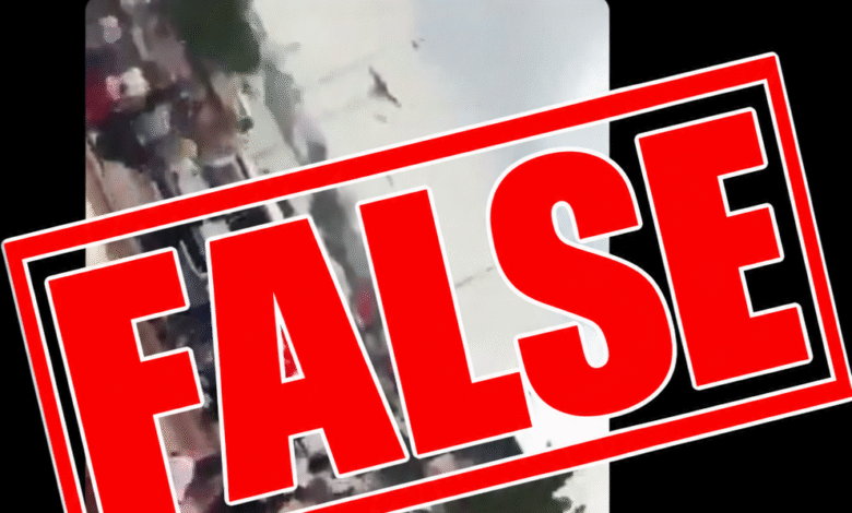 Screenshot of an X post by DJ SpoiltKid, showing a claim that an ongoing “TINUBU MUST GO!” protest is taking place in Nyanya, Abuja, with a blurred video of people gathered on a street. A large bold red “FALSE” stamp is overlaid diagonally across the post.