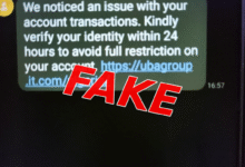 A screenshot of a suspicious UBA text message urging the recipient to verify their identity within 24 hours through a linked website, overlaid with the word “FAKE” in large, bold, red lettering.