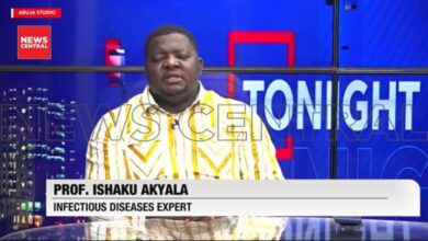 rof. Ishaku Akyala, an infectious diseases expert, wearing a yellow-and-white patterned traditional outfit while seated in the News Central television studio.